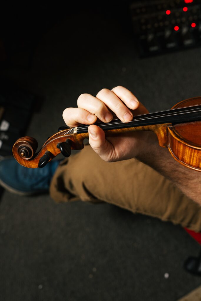 What is the difference between a fiddle and a violin?